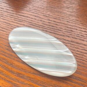 Striped Oval white lucite brooch